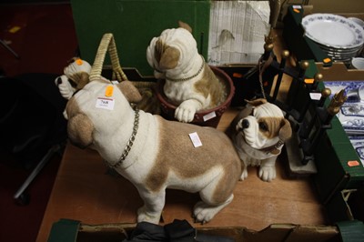 Lot 768 - A collection of four resin models of bulldogs