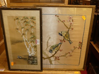 Lot 1107 - A woolwork panel depicting birds on flowering...