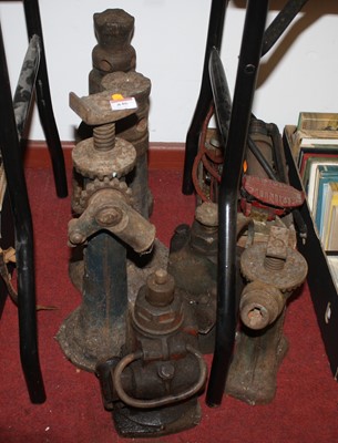 Lot 846 - A collection of cast iron and other car jacks...