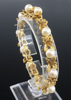 Lot 2646 - A yellow metal pearl bracelet, featuring...