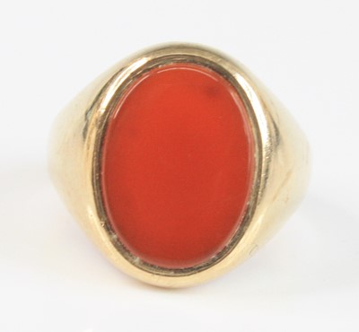 Lot 2658 - A 9ct yellow gold oval carnelian signet ring,...