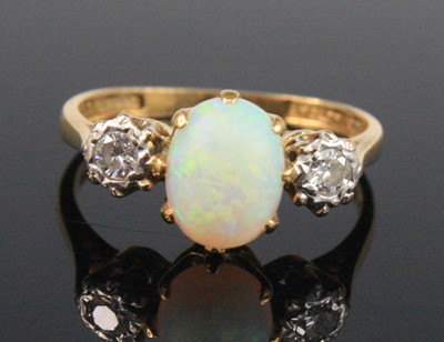 Lot 2661 - A yellow and white metal, opal and diamond...