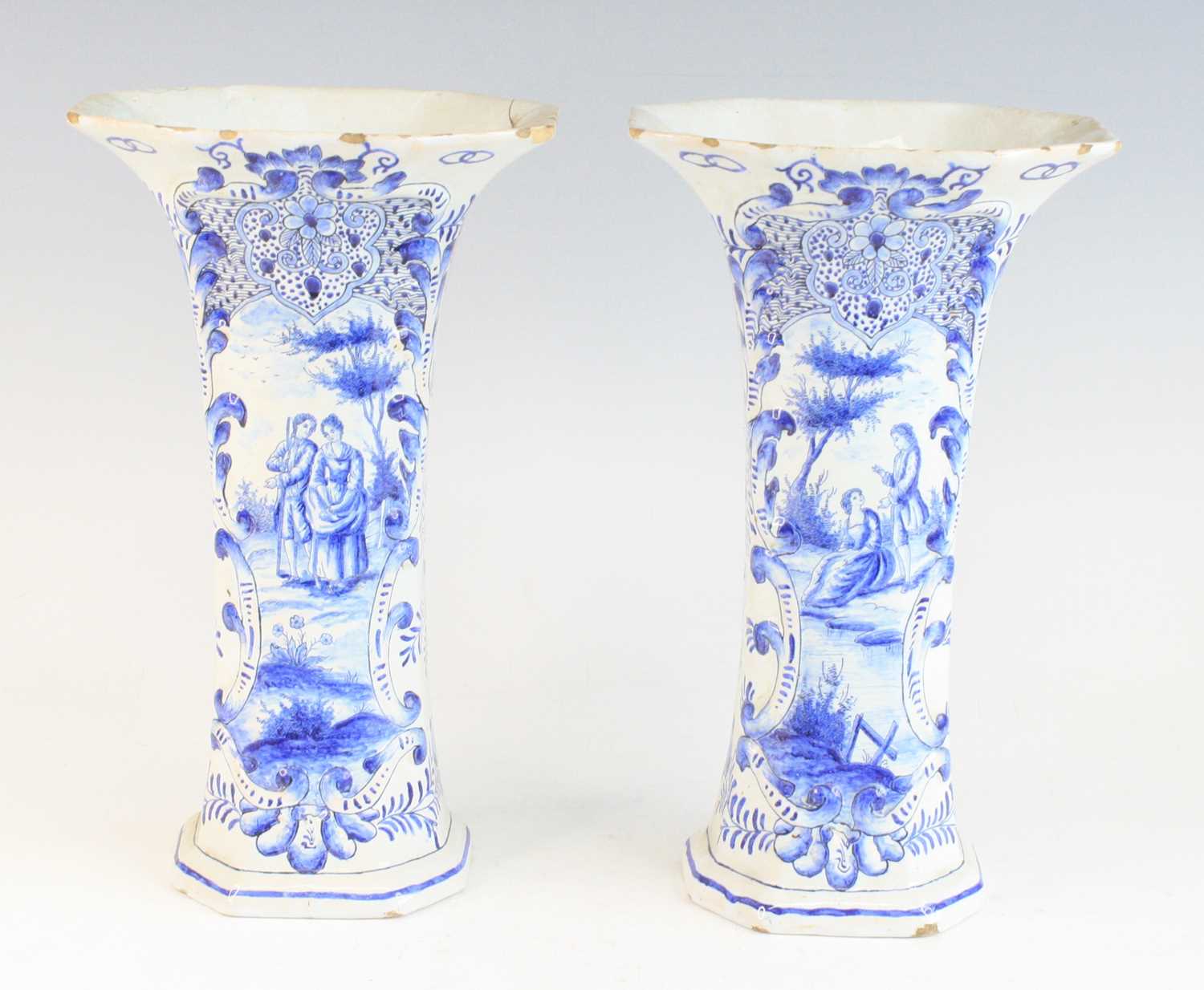 Lot 2047 - A pair of Delft blue and white trumpet vases,...
