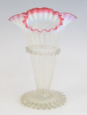 Lot 2078 - A cranberry and vaseline glass vase, 19th...
