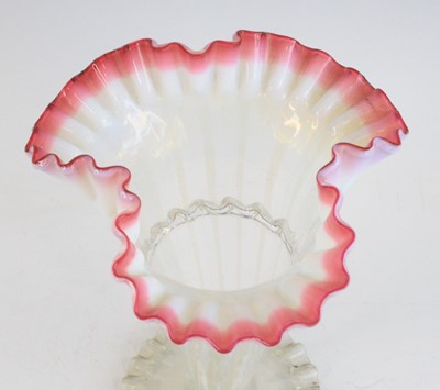 Lot 2078 - A cranberry and vaseline glass vase, 19th...