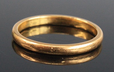 Lot 2673 - A 22ct gold wedding band, undecorated, sponsor...