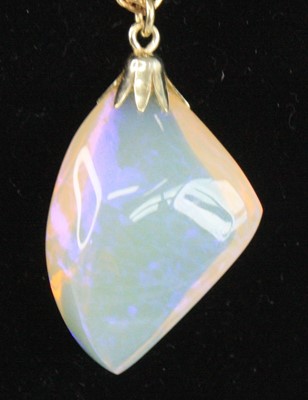 Lot 2684 - A contemporary polished and faceted opal...