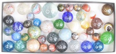 Lot 4109 - A collection of glass marbles, 19th century...