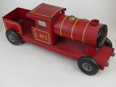 Lot 20 - A 20th century tin-plated model pull-along...