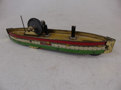 Lot 45 - Hess 1045 tinplate friction driven toy ship,...