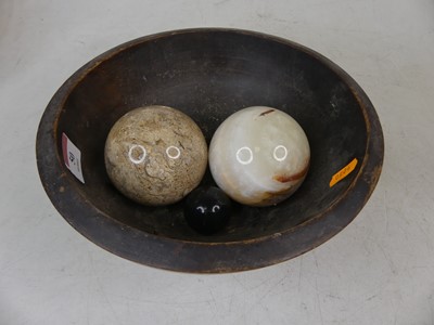 Lot 50 - Two polished hardstone balls, each dia.7cm;...