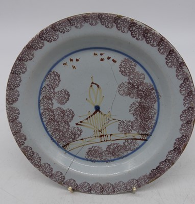 Lot 58 - An English delftware side plate, probably...