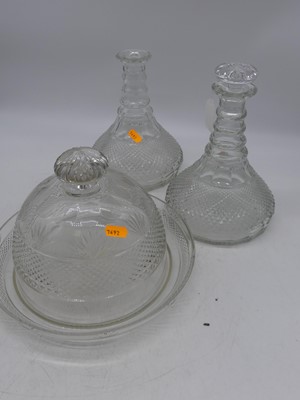 Lot 60 - A pair of Regency glass decanters, each with...
