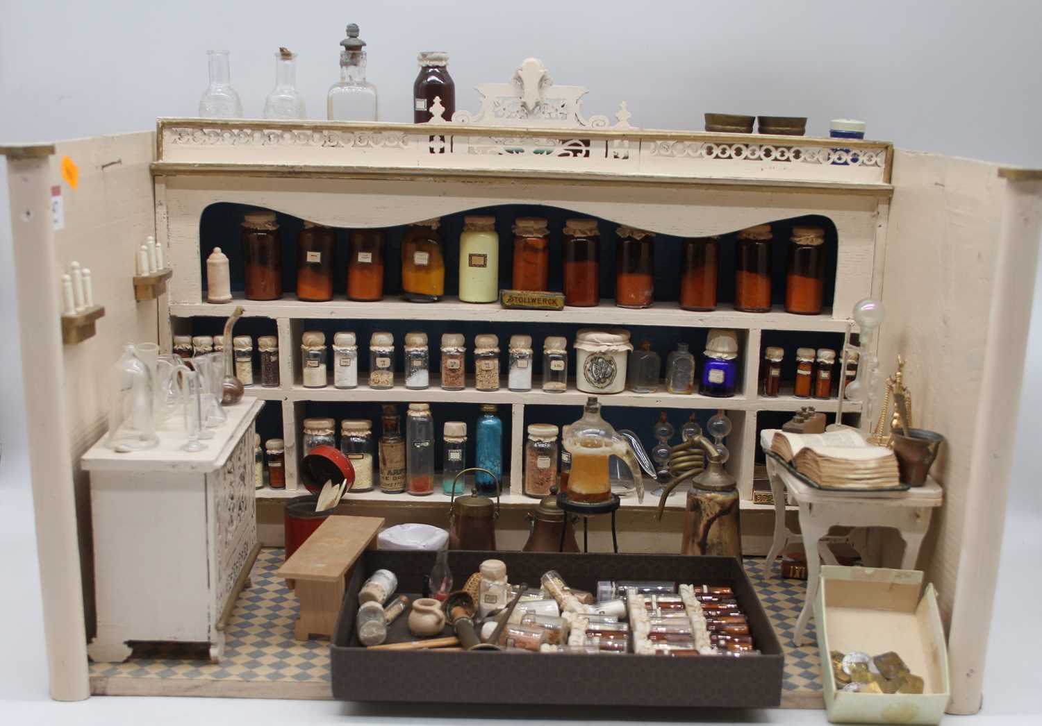 Lot 547 - A chemist shop diorama, German circa 1890, the...