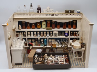 Lot 547 - A chemist shop diorama, German circa 1890, the...