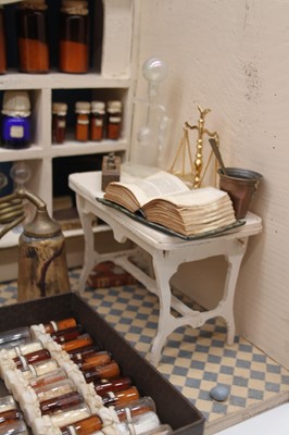 Lot 547 - A chemist shop diorama, German circa 1890, the...