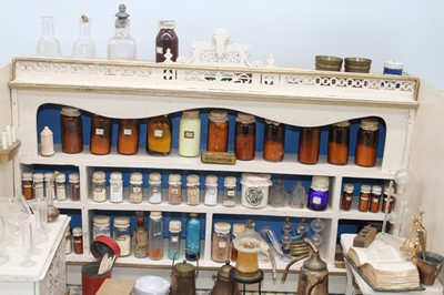 Lot 547 - A chemist shop diorama, German circa 1890, the...