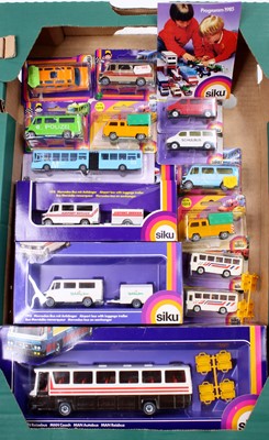 Lot 1430 - A collection of boxed Siku diecast, with...