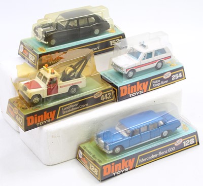 Lot 1206 - Four various Dinky Toy bubble packed diecast...