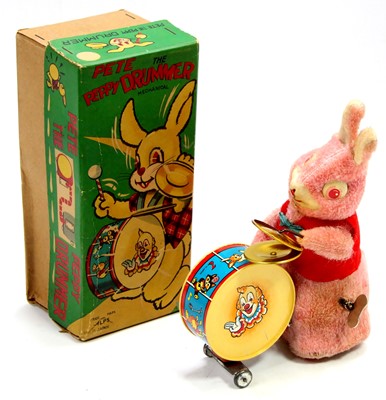 Lot 1561 - An Alps Toys of Japan tinplate and soft...