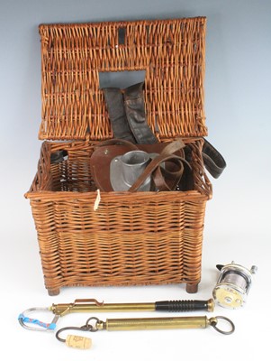 Lot 855 - A wicker creel and contents to include a brass...