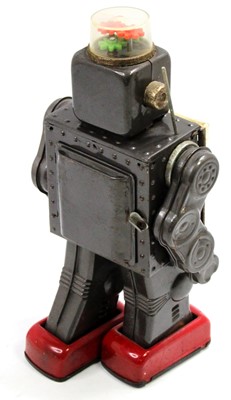 Lot 1723 - An SH Toys of Japan tin plate and battery...