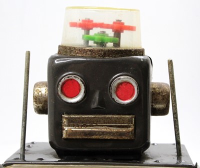 Lot 1723 - An SH Toys of Japan tin plate and battery...