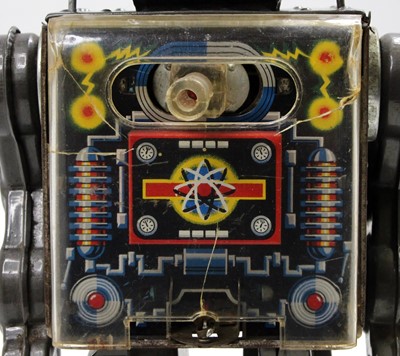 Lot 1723 - An SH Toys of Japan tin plate and battery...
