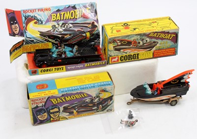 Lot 1263 - A Corgi Toys Batmobile and Batboat boxed group...