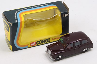 Lot 1285 - Corgi Toys Whizzwheels No. 418 London Taxi...