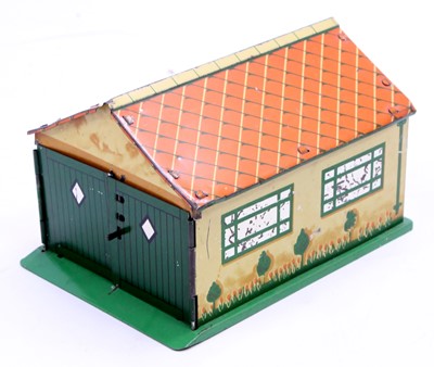 Lot 1189 - A Dinky Toys Pre-War No.45 tinplate Garage...