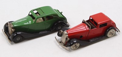 Lot 1593 - 2 Triang Minic tinplate clockwork cars...