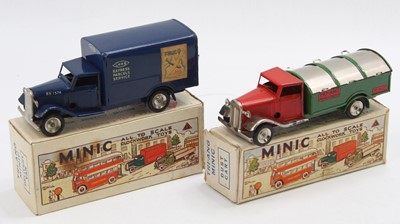 Lot 1586 - 2 boxed Triang Minic tinplate clockwork models...