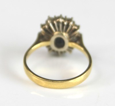 Lot 2159 - A yellow and white metal, sapphire and diamond...