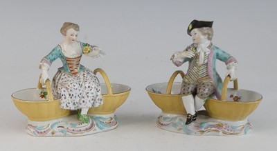 Lot 2059 - A pair of Meissen porcelain figural table...