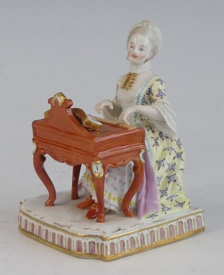 Lot 2058 - A Meissen porcelain figure of a lady, late...