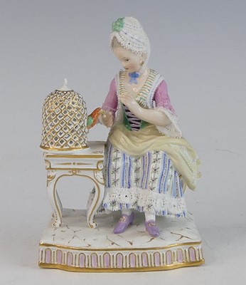 Lot 2057 - A Meissen porcelain figure of a lady, late...