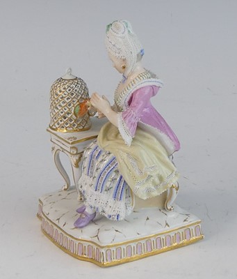 Lot 2057 - A Meissen porcelain figure of a lady, late...