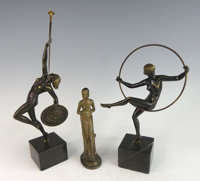 Lot 140 - An Art Deco style lacquered brass model of a...