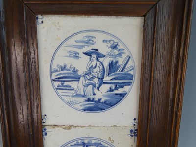 Lot 2048 - A set of four Delft blue and white tiles, 18th...