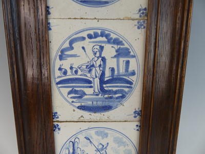 Lot 2048 - A set of four Delft blue and white tiles, 18th...