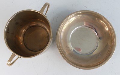 Lot 83 - An early Art Deco silver christening cup and...