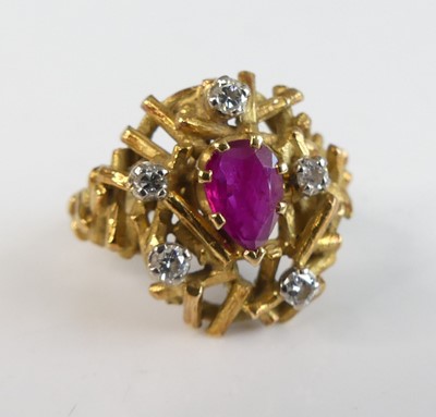 Lot 107 - A 1970s 18ct gold, ruby and diamond point set...
