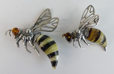 Lot 98 - A contemporary silver, amber and onyx effect...
