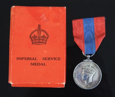 Lot 545 - A George VI Imperial Service Medal, naming...