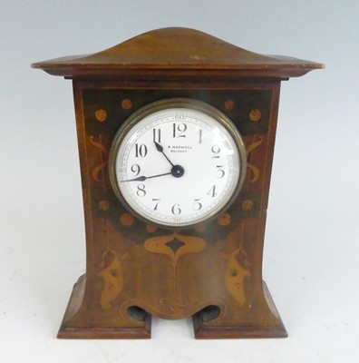 Lot 127 - An Art Nouveau mahogany and floral stylised...