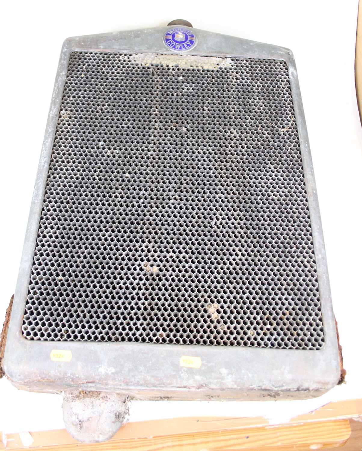 Lot 3030 - A Morris Cowley radiator, 60 x 45cm