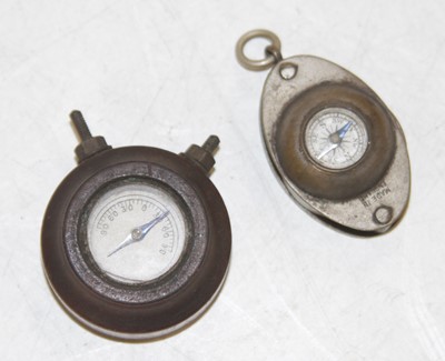 Lot 3052 - A miniature pocket compass, with inset loup,...