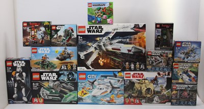 Lot 1661 - A collection of 13 Lego sets, all of which...