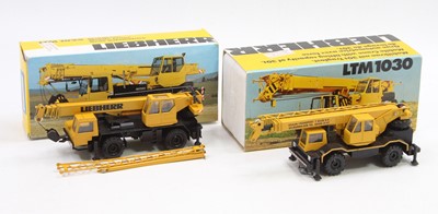 Lot 1055 - A Conrad 1/50 scale boxed mobile crane group...